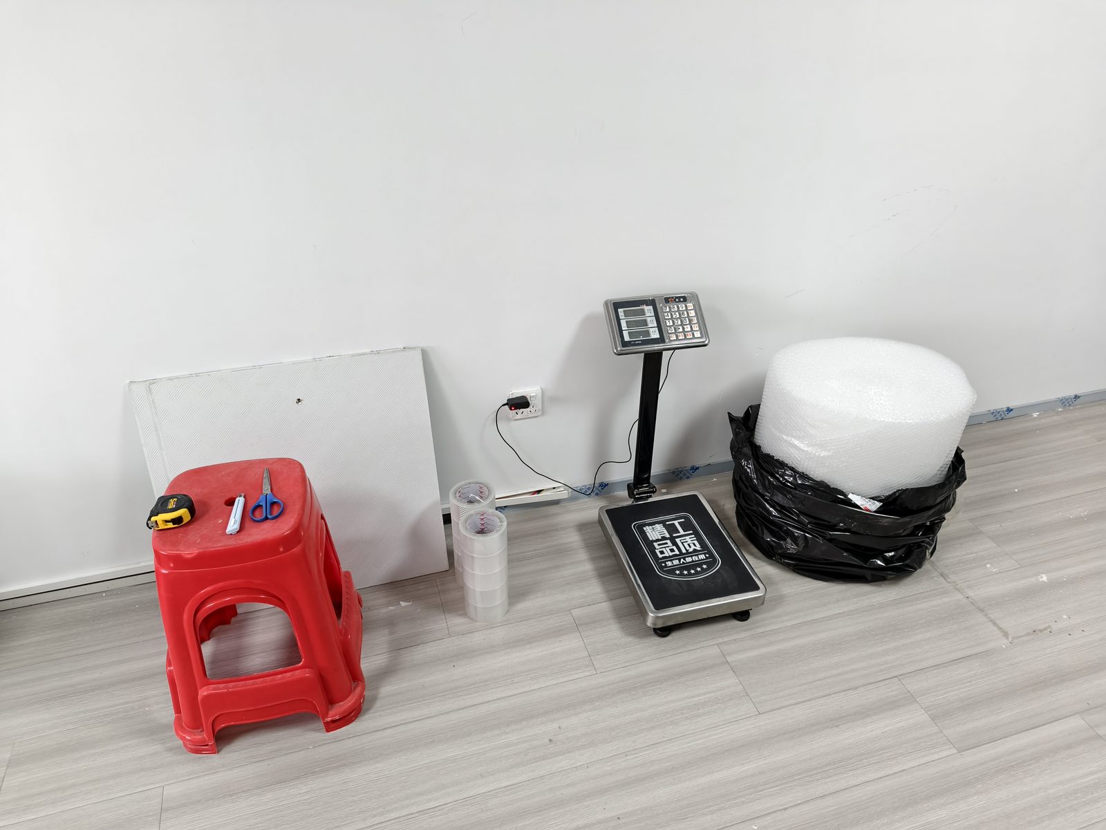 Weighing, taping and packing materials in our Shenzhen warehouse